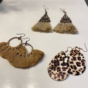 Three back of brown earrings